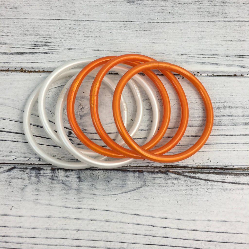 Orange and white bangle bracelet set 